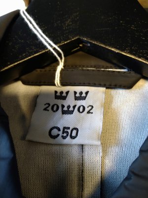 Zoom bild av Svenska försvarets Regnkappa